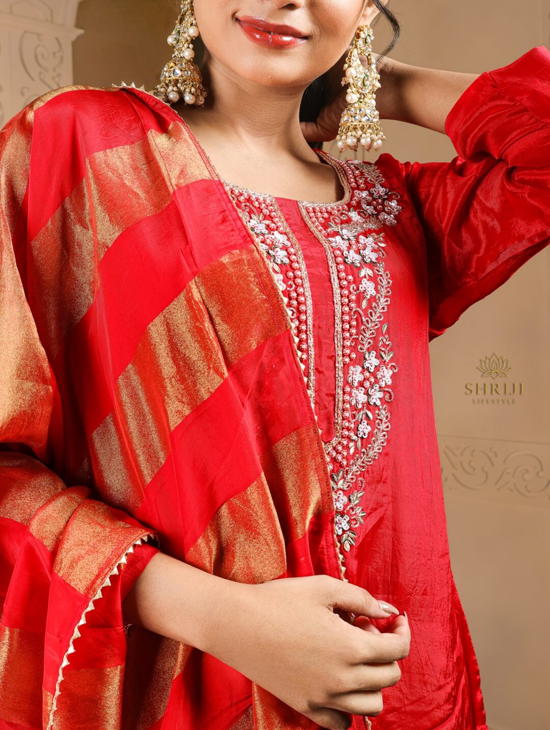 red suit set with dupatta
